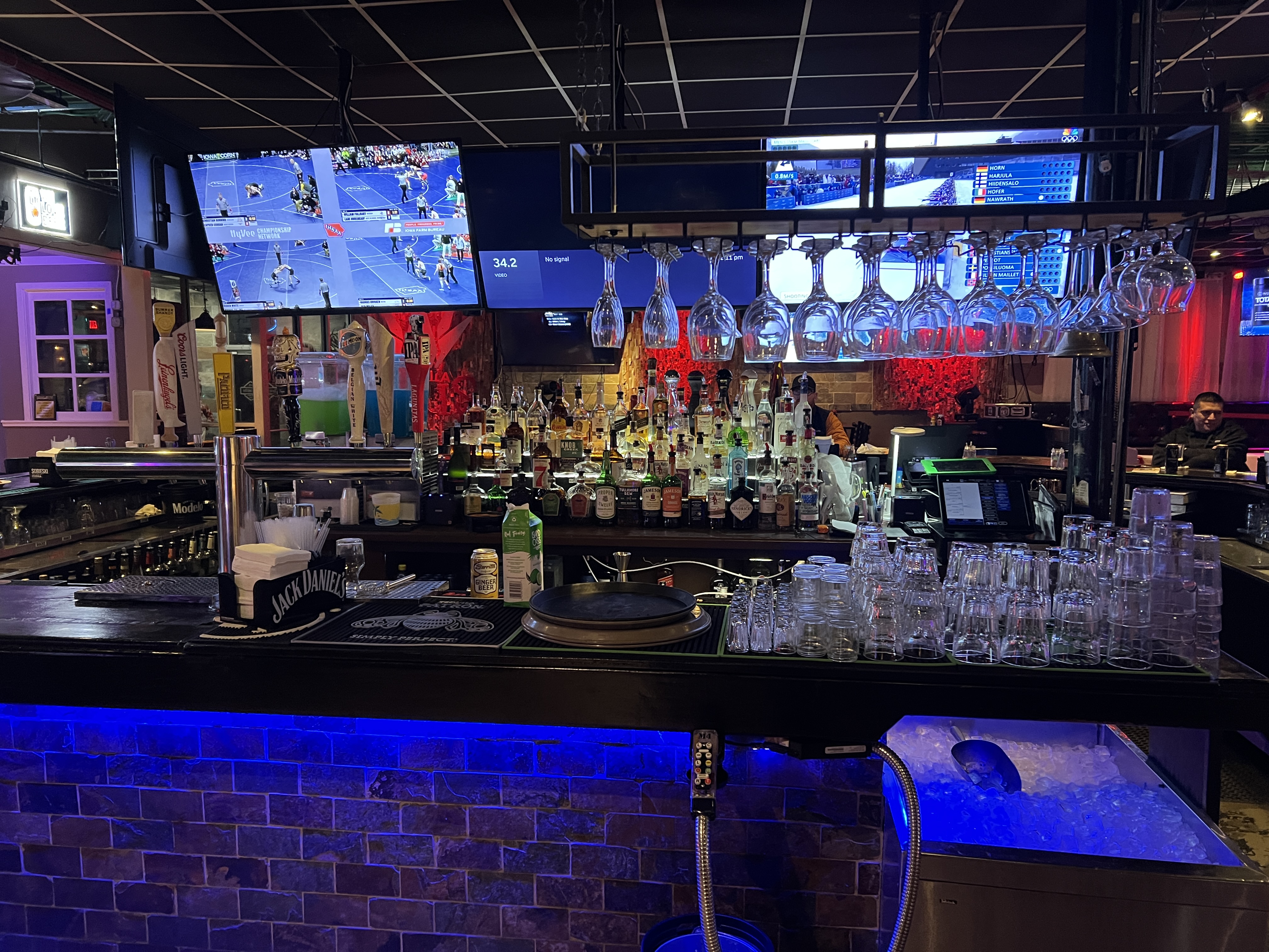 Full bar with neon lighting